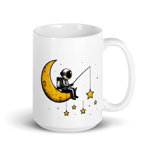 STAR FISHING white 15 oz mug. A figure on a yellow crescent moon casts a fishing line toward a star.